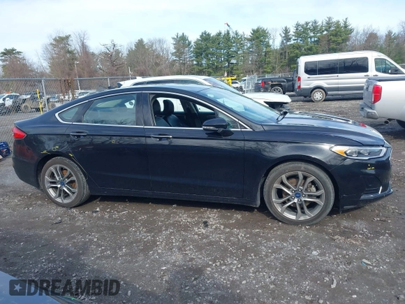 2019 Ford Fusion SEL with VIN 3FA6P0CD8KR265181, listed as a IAAI auction lot 41942425 with 66,228 mi miles and . Bid and sale history available at DreamBid. Image 13.