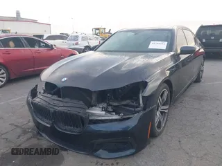 2016 BMW 7 Series 740i with VIN WBA7E2C51GG547537, listed as a IAAI auction lot 41794434 with 149,655 mi miles. Bid and sale history available at carsss.com. Image 18.