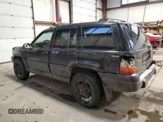 1998 Jeep Grand Cherokee Laredo with VIN 1J4GZ58Y9WC122076, listed as a Copart auction lot 84221784 with 387,353 mi miles and Salvage Title. Bid and sale history available at carsss.com. Image 2.