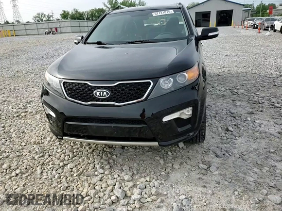 2013 Kia Sorento SX z VIN 5XYKWDA23DG369367, wystawiony jako Copart lot #57721075 z przebiegiem 133 560 mil mil oraz Szkoda całkowita • Salvage title. Historia ofert i sprzedaży dostępna na DreamBid. Obrazek 14.