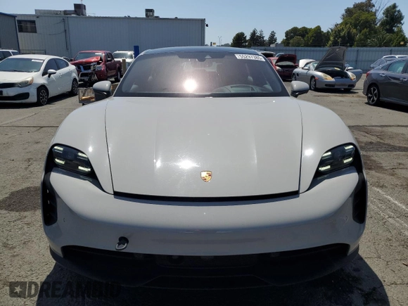 2023 Porsche Taycan z VIN WP0AA2Y16PSA13332, wystawiony jako Copart lot #55297385 z przebiegiem 18 822 mil mil oraz Szkoda całkowita • Salvage title. Historia ofert i sprzedaży dostępna na DreamBid. Obrazek 5.