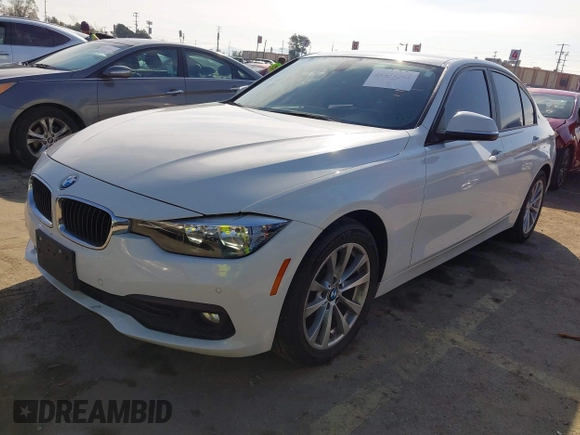 2016 BMW 3 Series 320i with VIN WBA8A9C59GK615704, listed as a IAAI auction lot 41431347 with 76,827 mi miles. Bid and sale history available at carsss.com. Image 2.