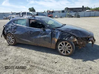 2017 Mazda 3 Grand Touring z VIN 3MZBN1M3XHM148604, wystawiony jako Copart lot #52258885 z przebiegiem Nie podano mil oraz Szkoda całkowita • Salvage title. Historia ofert i sprzedaży dostępna na DreamBid. Obrazek 4.