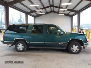 1997 Chevrolet Suburban with VIN 3GNFK16R6VG118242, listed as a IAAI auction lot 41349416 with 183,439 mi miles. Bid and sale history available at carsss.com. Image 13.