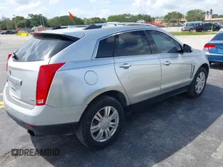 2013 Cadillac SRX Luxury Collection with VIN 3GYFNCE39DS512235, listed as a IAAI auction lot 38873243 with 133,378 mi miles and . Bid and sale history available at DreamBid. Image 4.