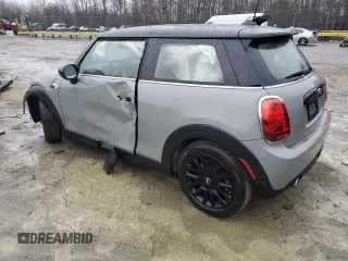 2021 MINI Hardtop Cooper with VIN WMWXR3C04M2N98103, listed as a Copart auction lot 42589255 with 61,317 mi miles and Salvage title. Bid and sale history available at DreamBid. Image 2.