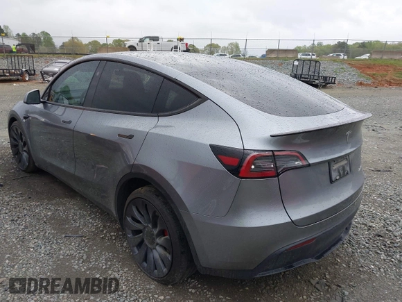 2024 Tesla Model Y Performance with VIN 7SAYGDEF2RA322351, listed as a IAAI auction lot 41953896 with 8,959 mi miles and . Bid and sale history available at DreamBid. Image 3.