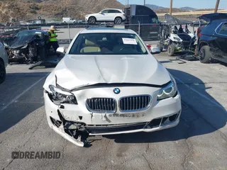 2014 BMW 5 Series 528i with VIN WBA5A5C5XED509484, listed as a IAAI auction lot 42607996 with 114,172 mi miles and . Bid and sale history available at DreamBid. Image 12.