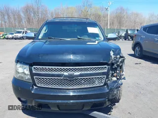 2009 Chevrolet Suburban LTZ with VIN 1GNFK36399J124158, listed as a IAAI auction lot 42063097 with 204,856 mi miles. Bid and sale history available at carsss.com. Image 12.
