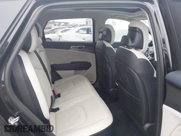 2023 Kia Sportage EX with VIN KNDPVCAG1P7043695, listed as a IAAI auction lot 42505834 with 16,192 mi miles and . Bid and sale history available at DreamBid. Image 8.