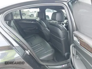 2019 BMW 5 Series M550i xDrive with VIN WBAJB9C51KB287797, listed as a IAAI auction lot 41549311 with 61,459 mi miles and . Bid and sale history available at DreamBid. Image 8.