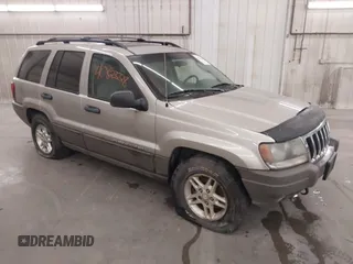 2003 Jeep Grand Cherokee Laredo z VIN 1J4GW48SX3C544237, wystawiony jako IAAI lot #40823228 z przebiegiem Nie podano mil oraz . Historia ofert i sprzedaży dostępna na DreamBid. Obrazek 1.