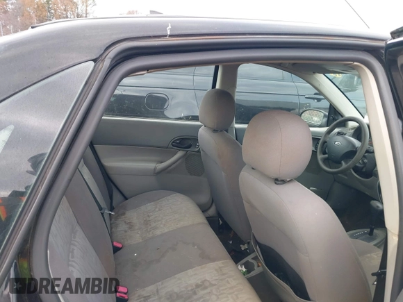 2005 Ford Focus S with VIN 1FAFP34N75W304479, listed as a IAAI auction lot 41117405 with 234,312 mi miles. Bid and sale history available at carsss.com. Image 8.