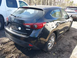 2015 Mazda 3 i Touring with VIN JM1BM1L7XF1246035, listed as a IAAI auction lot 41819595 with 124,535 mi miles and . Bid and sale history available at carsss.com. Image 4.