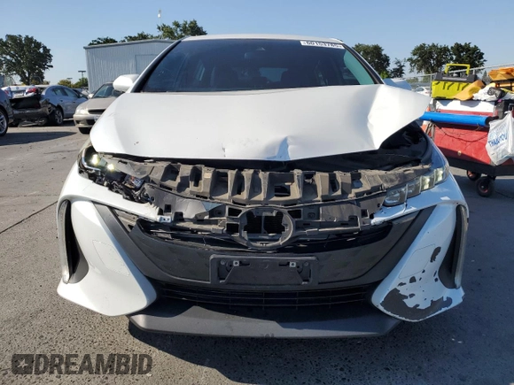 2021 Toyota Prius LE with VIN JTDKAMFP6M3191509, listed as a Copart auction lot 60153785 with 112,625 mi miles and Salvage title. Bid and sale history available at DreamBid. Image 5.
