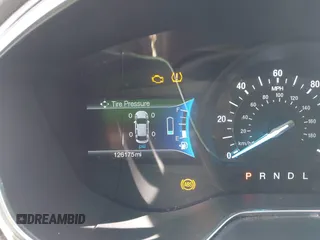 2017 Ford Fusion Energi SE with VIN 3FA6P0PU4HR380184, listed as a IAAI auction lot 42099750 with 126,175 mi miles. Bid and sale history available at carsss.com. Image 16.