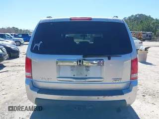 2011 Honda Pilot Touring with VIN 5FNYF4H91BB086712, listed as a IAAI auction lot 41809369 with 260,718 mi miles. Bid and sale history available at carsss.com. Image 16.