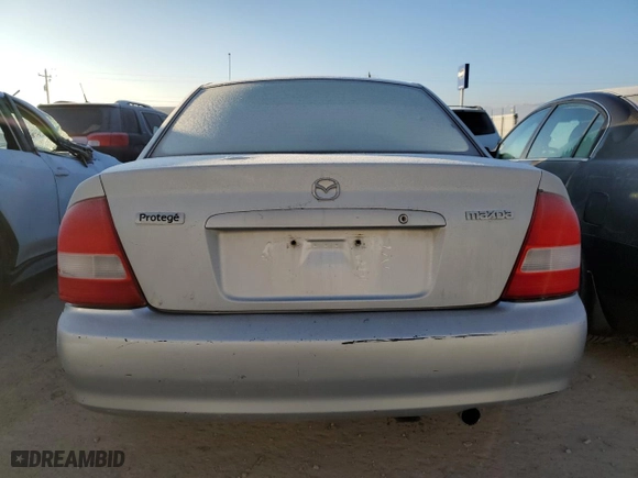 2000 Mazda Protege ES with VIN JM1BJ2213Y0266275, listed as a Copart auction lot 59480054 with 189,616 mi miles and Salvage Title. Bid and sale history available at carsss.com. Image 6.