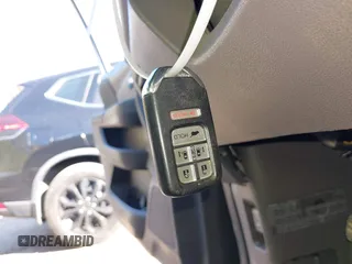 2015 Honda Odyssey Touring Elite with VIN 5FNRL5H99FB094727, listed as a IAAI auction lot 42001288 with 254,015 mi miles and . Bid and sale history available at DreamBid. Image 11.