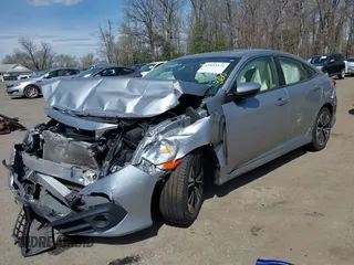 2018 Honda Civic EX-L with VIN JHMFC1F72JX043788, listed as a IAAI auction lot 41853131 with 137,266 mi miles and . Bid and sale history available at DreamBid. Image 2.