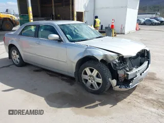 2006 Chrysler 300 Touring with VIN 2C3KK53G36H150931, listed as a IAAI auction lot 41934358 with 110,136 mi miles. Bid and sale history available at carsss.com. Image 1.