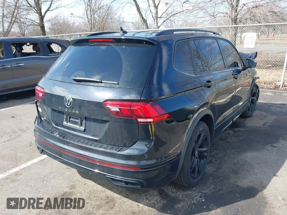 2023 Volkswagen Tiguan SE R-Line Black with VIN 3VVCB7AXXPM094621, listed as a IAAI auction lot 41737103 with 21,069 mi miles and . Bid and sale history available at DreamBid. Image 4.