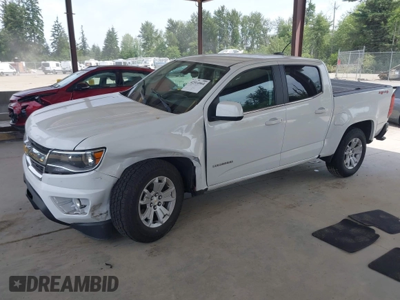2018 Chevrolet Colorado 4WD LT with VIN 1GCGTCENXJ1277214, listed as a IAAI auction lot 42514964 with 64,635 mi miles and . Bid and sale history available at DreamBid. Image 2.