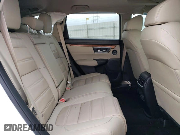 2020 Honda CR-V Touring z VIN 7FARW2H96LE000955, wystawiony jako Copart lot #51335415 z przebiegiem 37 322 mil mil oraz Szkoda całkowita • Salvage title. Historia ofert i sprzedaży dostępna na DreamBid. Obrazek 11.