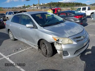 2011 Toyota Corolla L with VIN JTDBU4EE7BJ108265, listed as a IAAI auction lot 41969221 with 104,273 mi miles. Bid and sale history available at carsss.com. Image 1.