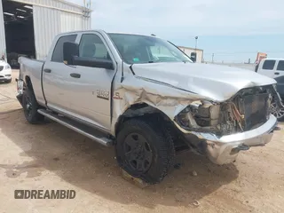 2015 Ram 2500 Tradesman z VIN 3C6UR5CL6FG513999, wystawiony jako IAAI lot #42259171 z przebiegiem 265 657 mil mil oraz . Historia ofert i sprzedaży dostępna na DreamBid. Obrazek 1.