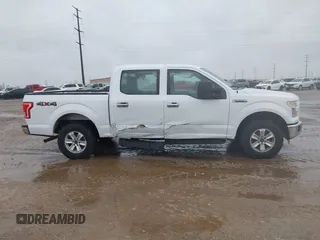 2015 Ford F-150 XLT with VIN 1FTEW1E89FKF04262, listed as a IAAI auction lot 41693065 with 182,387 mi miles. Bid and sale history available at carsss.com. Image 13.