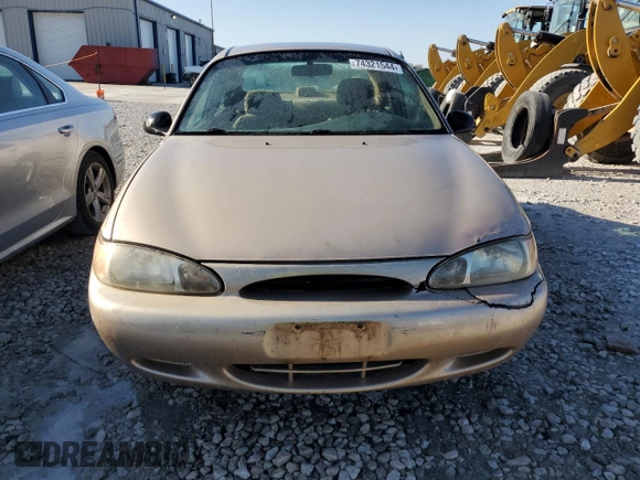 1997 Ford Escort LX with VIN 1FALP13P0VW403591, listed as a Copart auction lot 74321544 with 134,706 mi miles and Salvage Title. Bid and sale history available at DreamBid. Image 5.