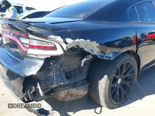 2018 Dodge Charger SXT Plus with VIN 2C3CDXHG9JH281387, listed as a IAAI auction lot 41402210 with 132,881 mi miles and . Bid and sale history available at carsss.com. Image 6.