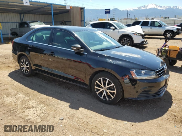 2017 Volkswagen Jetta SE with VIN 3VWDB7AJ4HM204110, listed as a Copart auction lot 57890655 with 82,817 mi miles and Salvage title. Bid and sale history available at DreamBid. Image 4.