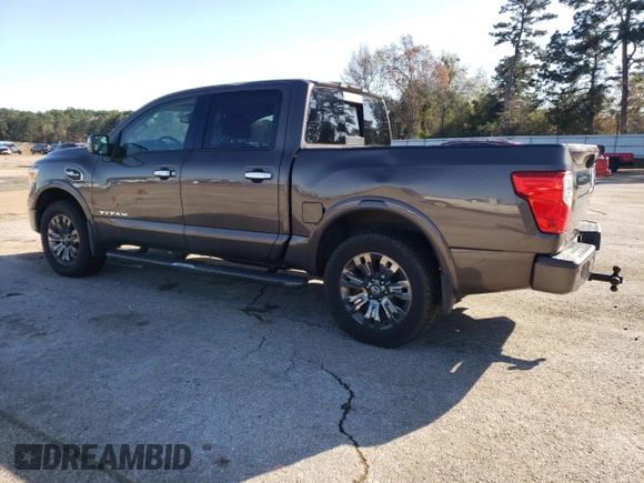 2017 Nissan Titan SL z VIN 1N6AA1E54HN512447, wystawiony jako Copart lot #85330734 z przebiegiem 119 424 mil mil oraz Czysty tytuł • Clean title. Historia ofert i sprzedaży dostępna na DreamBid. Obrazek 2.