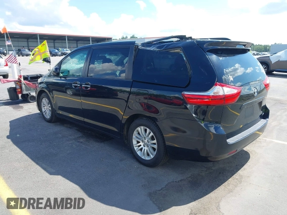2016 Toyota Sienna XLE with VIN 5TDYK3DC8GS711357, listed as a IAAI auction lot 42525086 with 180,296 mi miles and . Bid and sale history available at DreamBid. Image 3.
