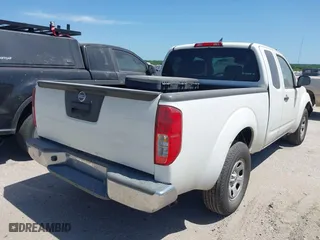 2016 Nissan Frontier S with VIN 1N6BD0CT6GN763783, listed as a IAAI auction lot 41976206 with 104,447 mi miles. Bid and sale history available at carsss.com. Image 4.
