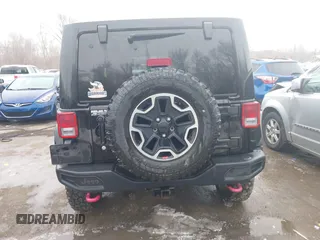 2015 Jeep Wrangler Unlimited Rubicon Hard Rock with VIN 1C4HJWFG9FL569962, listed as a IAAI auction lot 41557801 with 78,597 mi miles and . Bid and sale history available at DreamBid. Image 16.