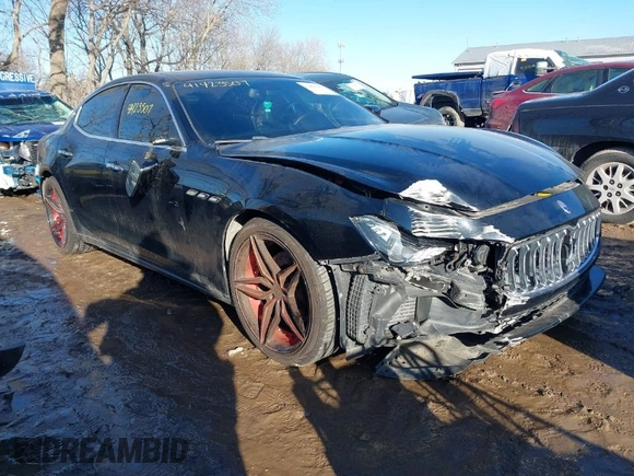 2014 Maserati Ghibli z VIN ZAM57XSA4E1090315, wystawiony jako IAAI lot #41423507 z przebiegiem 115 323 mil mil oraz . Historia ofert i sprzedaży dostępna na DreamBid. Obrazek 1.