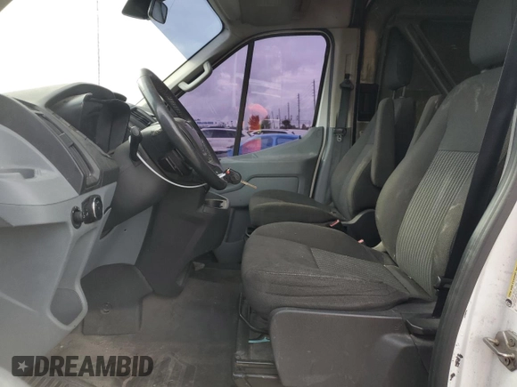 2015 Ford Transit with VIN 1FTNR2CVXFKA12717, listed as a Copart auction lot 76483854 with 268,957 mi miles and Salvage Title. Bid and sale history available at DreamBid. Image 7.