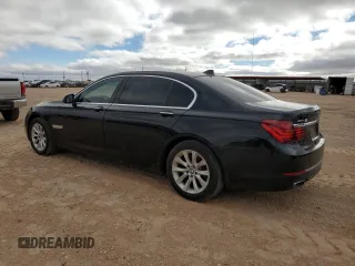 2015 BMW 7 Series 740Li xDrive with VIN WBAYF4C50FGS99289, listed as a Copart auction lot 79809474 with 128,993 mi miles and Salvage Title. Bid and sale history available at carsss.com. Image 2.