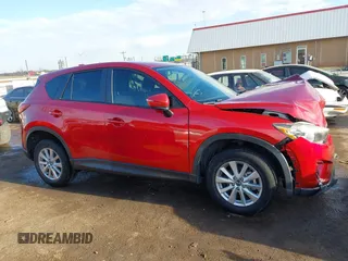 2015 Mazda CX-5 Sport z VIN JM3KE2BE7F0516869, wystawiony jako IAAI lot #41866488 z przebiegiem 131 237 mil mil oraz . Historia ofert i sprzedaży dostępna na DreamBid. Obrazek 13.