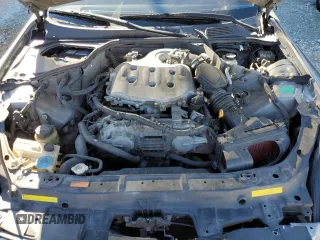2004 Infiniti G35 Coupe w/Leather with VIN JNKCV54E44M827899, listed as a Copart auction lot 81534144 with 215,637 mi miles and Salvage Title. Bid and sale history available at carsss.com. Image 13.