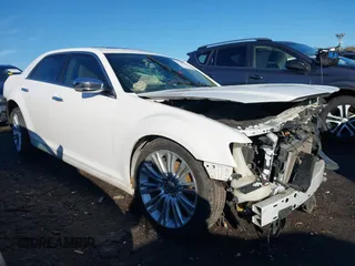 2011 Chrysler 300 with VIN 2C3CA6CT2BH537877, listed as a IAAI auction lot 41405184 with 212,027 mi miles. Bid and sale history available at carsss.com. Image 1.