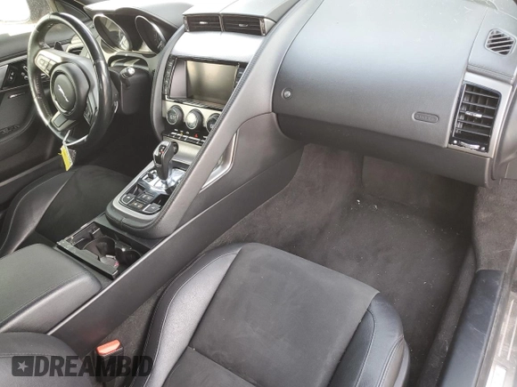 2014 Jaguar F-Type V6 with VIN SAJWA6E7XE8K09479, listed as a Copart auction lot 49477115 with 93,755 mi miles and Salvage Title. Bid and sale history available at DreamBid. Image 8.