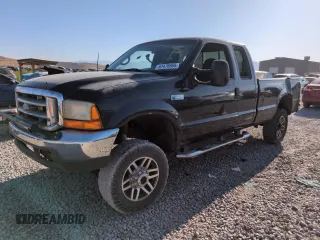 1999 Ford F-250 XL with VIN 1FTNX21FXXEC98957, listed as a Copart auction lot 61476665 with 414,070 mi miles and Salvage title. Bid and sale history available at DreamBid. Image 1.