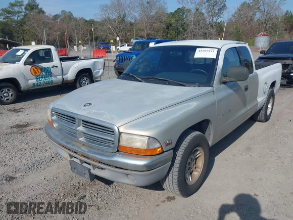 2000 Dodge Dakota with VIN 1B7GL22XXYS577744, listed as a IAAI auction lot 41509241 with 163,054 mi miles. Bid and sale history available at carsss.com. Image 6.