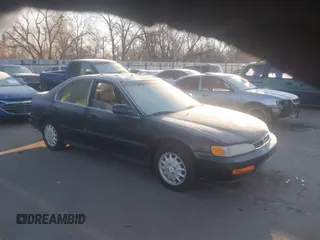 1996 Honda Accord EX w/Leather with VIN 1HGCD5666TA176707, listed as a IAAI auction lot 41328043 with 174,374 mi miles. Bid and sale history available at carsss.com. Image 1.