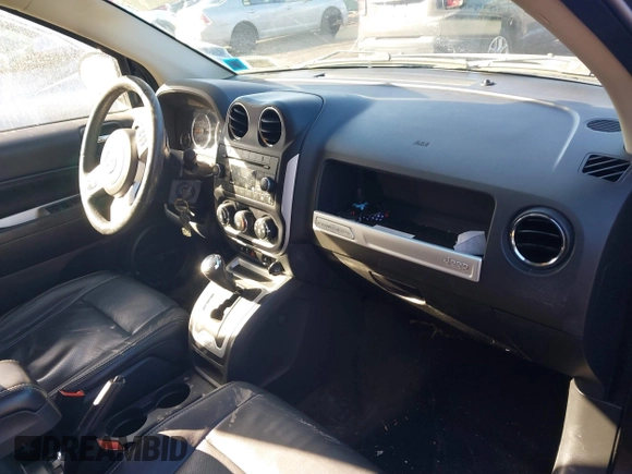 2016 Jeep Compass Latitude with VIN 1C4NJDEB7GD746114, listed as a IAAI auction lot 41571587 with 112,645 mi miles. Bid and sale history available at carsss.com. Image 5.