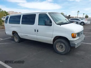 2003 Ford Econoline Passenger XL with VIN 1FBSS31L93HB86614, listed as a IAAI auction lot 41630824 with 117,019 mi miles. Bid and sale history available at carsss.com. Image 1.